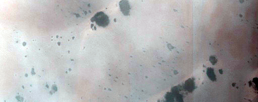 Intracrater Dune Field and Associated Extracrater Dark Streak
