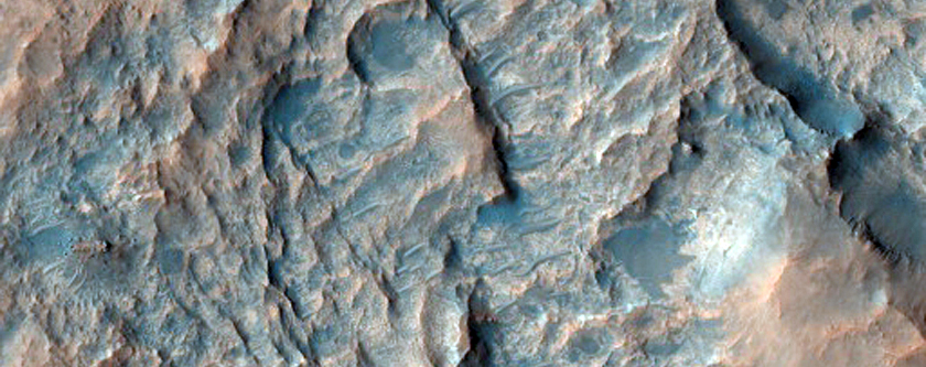 Light-Toned Material Filling Exhumed Crater
