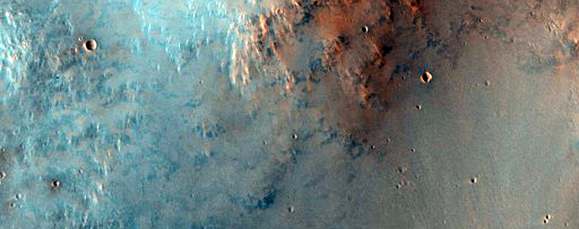 Impact Crater with Pitted Central Peak
