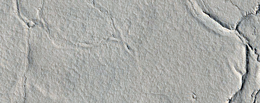 Decameter-Scale Patterned Ground and Possible Pits