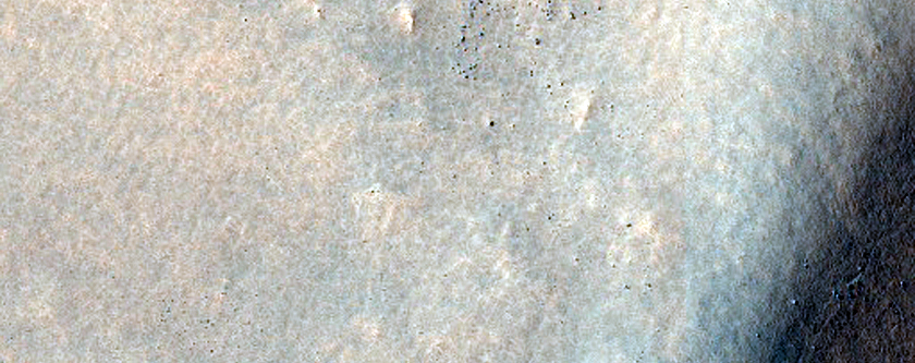 Impact Crater with Unusual Collapse Feature and Possible Lava Flow