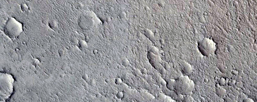 Layered Materials in Crater in Arabia Region