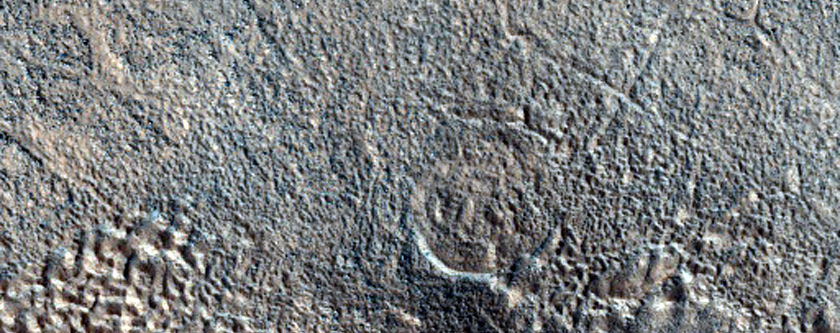 Layered Feature in Crater in Deuteronilus Mensae