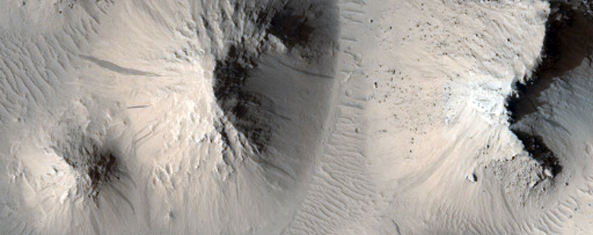 Chaos-Like Feature Near Apollinaris Patera