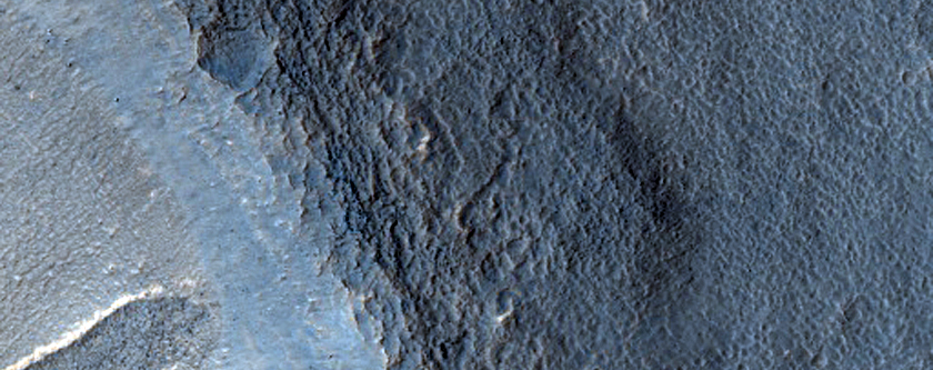 Layered Deposit in Crater in Hellas Montes Region