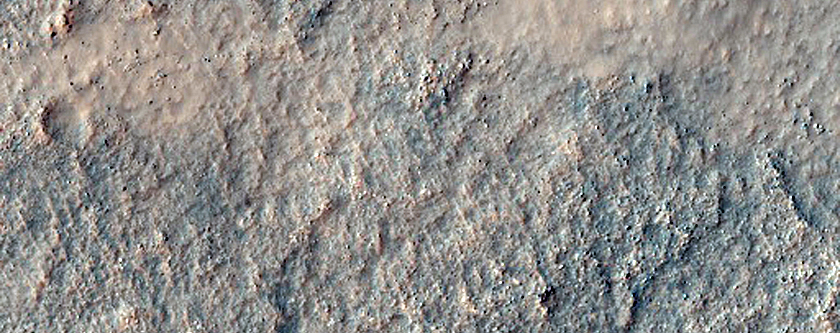 Possible Bedrock Exposure on Degraded Crater Floor