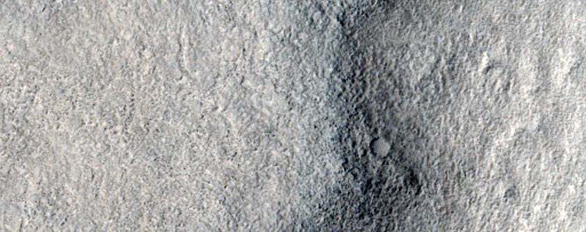 Dipping Layers in Crater along Reull Vallis