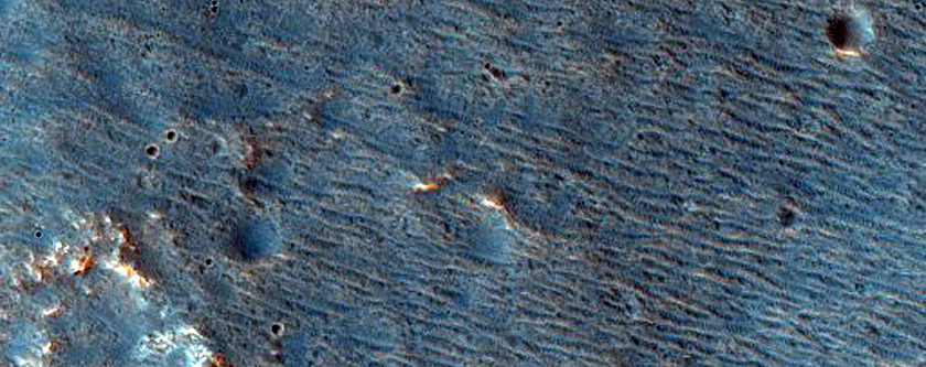 Channels Near Crater Rim Northwest of Hadriaca Patera
