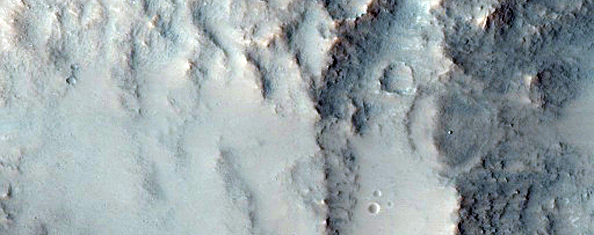 Layers Exposed in Crater in Solis Planum
