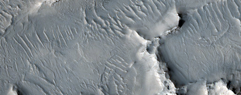 Layered Materials in Crater in Arabia Terra
