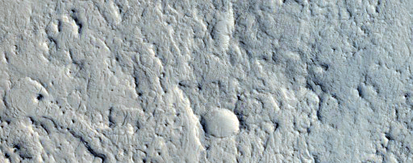 Layered Mesa in Tikhonravov Crater
