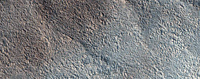 Channels and Crater in Northern Mid-Latitudes
