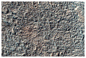 Fan Materials at Termini of Channels in East Hellas Planitia
