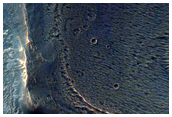 Exposure of Light-Toned Materials within Noctis Labyrinthus Hills
