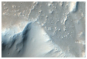 Relation of Flow Inside and Outside of Impact Crater in Tharsis Region
