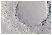 Mesa with Ciruclar and Arcuate Scarp Elements
