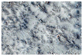 Possible Glacial-Like Outwash Systems in Phlegra Montes
