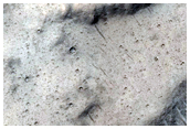 Pasted-on Material on Crater Ejecta

