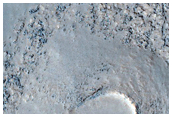 Mesa with Circular and Arcuate Scarp Elements