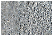 Topography and Geomorphology of Surface and Contacts in Astapus Colles
