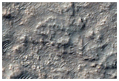 Bedrock Exposures and Possible Chlorides in Terra Cimmeria
