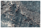 Possible Kaolinite Detection in Rim of Lassell Crater
