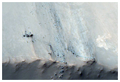 3-Kilometer Crater in Thermophysically Unique Bakhuysen Crater Ejecta
