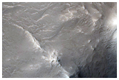 Possible Hydrated Silica and Phyllosilicates in Central Peak of Crater
