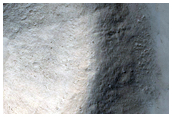 Small Crater Exposing Subsurface
