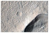 Topography and Geomorphology of Surface and Contacts in Astapus Colles
