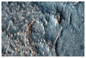 Fractures and Exposed Bedrock in Lyot Crater
