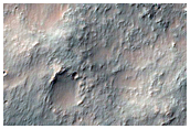 Sirenum Fossae and Erosional Remnant with Albedo Variations
