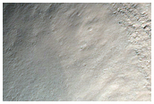 Monitor Crater Slope in Solis Planum
