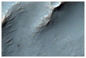 Wrinkle Ridge and Channel Intersection along Huygens Crater Rim
