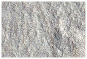 Depression with Layers in Nilosyrtis Mensae
