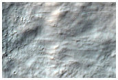 Fresh 1-Kilometer Impact Crater in Terra Cimmeria
