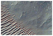 Exposed Bedrock in Western Central Uplift of 10-Kilometer Diameter Crater
