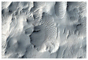 Highly Disrupted Crater in Elysium Planitia
