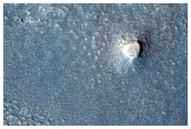 Hills or Massifs with Concentric Geomorphic Features
