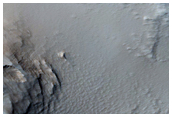 Cone-Like Structure Surrounded by Lava Flows in Tharsis Region
