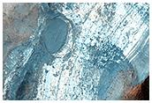 Eroded Infill or Uplift within Degraded Crater in Nili Fossae Region
