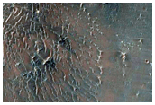 Impact Crater on Floor of Huygens Crater
