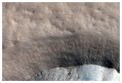 Impact Crater on Northern Plains
