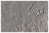 Shallow Depression West of Olympus Mons
