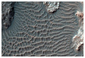 Well-Preserved Crater with Central Uplift and Layered Ejecta
