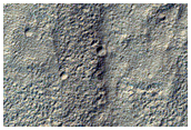 Monitor Mid-Latitude Apron and Tongue Materials in Reull Vallis
