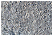 Infrared-Distinct Crater on Northern Plains
