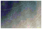 Light and Dark Bands in Crater in Southeastern Arabia Terra
