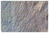 Contact between Light-Toned Deposits and Wallrock in Northern Melas Chasma
