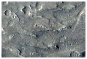 Fan-Shaped Features in Gunjur Crater
